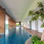 Comfortable Studio Room At Capitol Suites Apartment By Travelio