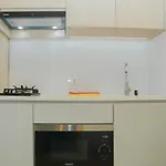Comfortable Studio Room At Capitol Suites Apartment By Travelio