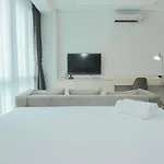 Comfortable Studio Room At Capitol Suites Apartment By Travelio